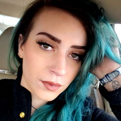 Stylish Individual in Car