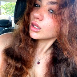 Female Model Piper, Casually Styled in Red and Brown