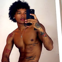 Fit and Tattooed Male Model in OnlyFans Advertisement