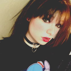 Emo Style with Dark Hair and Bold Makeup