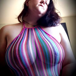 Onlyfans Model DaddysLittleBrat in Multi-Colored Bodysuit