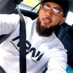 Instagram Model Taking a Selfie in the Car