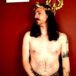 Olympus Apollo Du Soleil, a Model in Costume