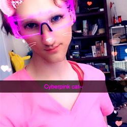 Person in Pink Shirt with Cat Ears and Glasses