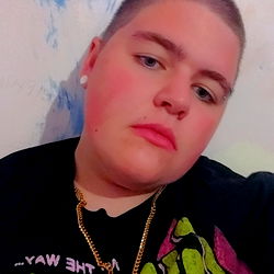 Young Adult Male with Shaved Head and Tattoos, Model Photo for Onlyfans