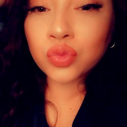 Exotic Mami's Playful Pose