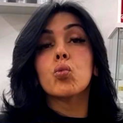 TsValiere, a model from OnlyFans with a pouty expression and short hair,