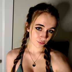 Ana Grace, OnlyFans Model: Smiling in a Sports Bra