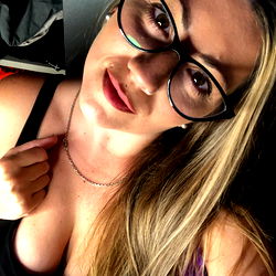 Model Showing Off Her Necklace in Selfie