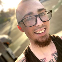 Patrick: Young Adult Male with a Beard and Tattoos, Smiling