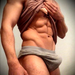 Fit Model Showcasing Abs in Onlyfans