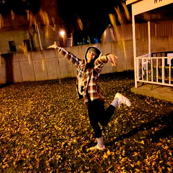 Candid Moment of a Leaf-Chasing Dancer