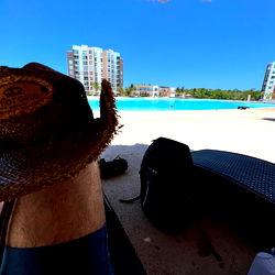 Taking a Break Under the Beach Umbrella