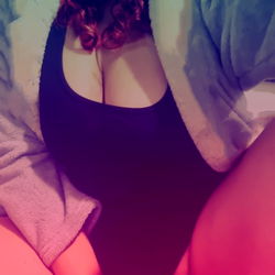 Female OnlyFans Model AFRO in Black Tankini