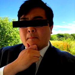 A Man in a Suit Pondering Thoughtfully