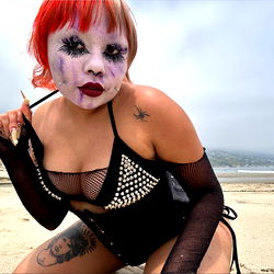 Vibrant OnlyFans Model in Beach Photoshoot