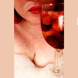 Woman Enjoying a Wine Bath