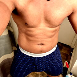 Onlyfans Model Justin Strikes a Pose in Blue Boxer Briefs
