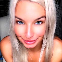 Heni Heaven, a Beautiful Woman with Blonde Hair and Blue Eyes