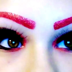 A Model with Red Eyeliner and Dark Hair