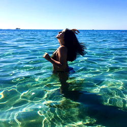 Addie Ray in Swimwear on Beach