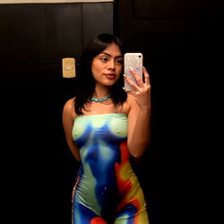 Vividly Colored Fashion Model in OnlyFans Advertisement