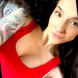 Beautiful Tattooed Woman with Red Tank Top and Tattoos, OnlyFans Model Photo