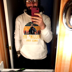 A Man Taking a Selfie in a Mirror