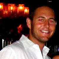 Man in a white shirt at a formal event