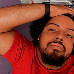 Model in a Casual Pose with Arms Overhead