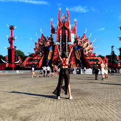 A lively festival in progress at a red temple