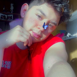 Fashionable Young Man in Casual Outfit Taking a Selfie