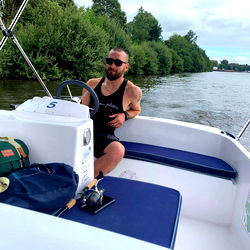 Caesar the Carpenter on a Serene River Cruise