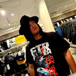 Emo Boy in Store Mirror, Budapest