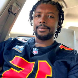 A Man Relaxing in a Car