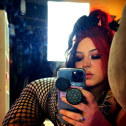 Katahdin, a provocative OnlyFans model showcasing her style and confidence.