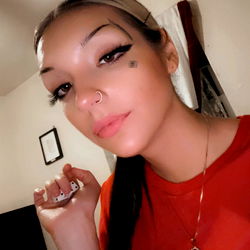 Stylish OnlyFans Model in a Room