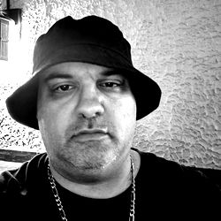 Junior, a man from Westchester County, NY, in a relaxed pose