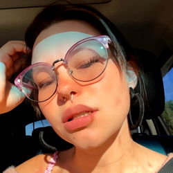 Emmiekae - Stylish Female Model in Sunglasses Posing for the Camera