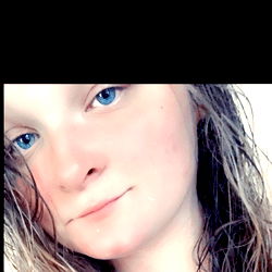 A person posing for a photograph