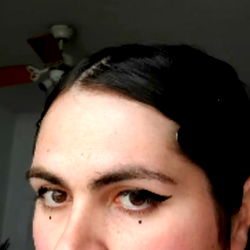 Mara, 25, Female with Dark Eye Makeup