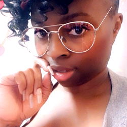 Stylish Model with Cherry Blossom Headband and Grapes