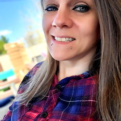 Arizona-Based Model, Princezzpurple, Poses in a Flannel Shirt and Tattoo