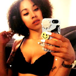 KikiButterfly, 23-year-old Florida-based OnlyFans model in a black lingerie