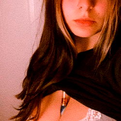 Jade, a beautiful model showing off her chest