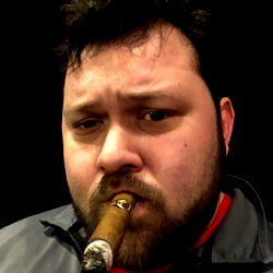 Man in Jacket, Holding Cigar and Making Face