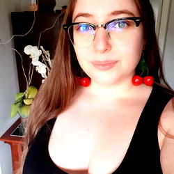 Anastasia, a London-based Model, Captures the Spirit of Summer with Her Red Cherry Earrings