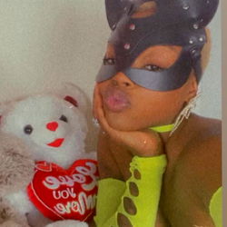 OnlyFans Model RARRI Poses in a Cat Costume with Toys