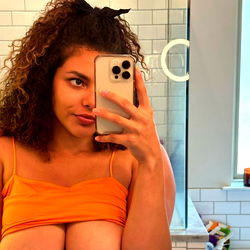 Isabella Model in Bathrobe Taking a Mirror Selfie