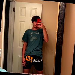 Model Justin, Sporting Green and Yellow Jersey with Words, in Gym